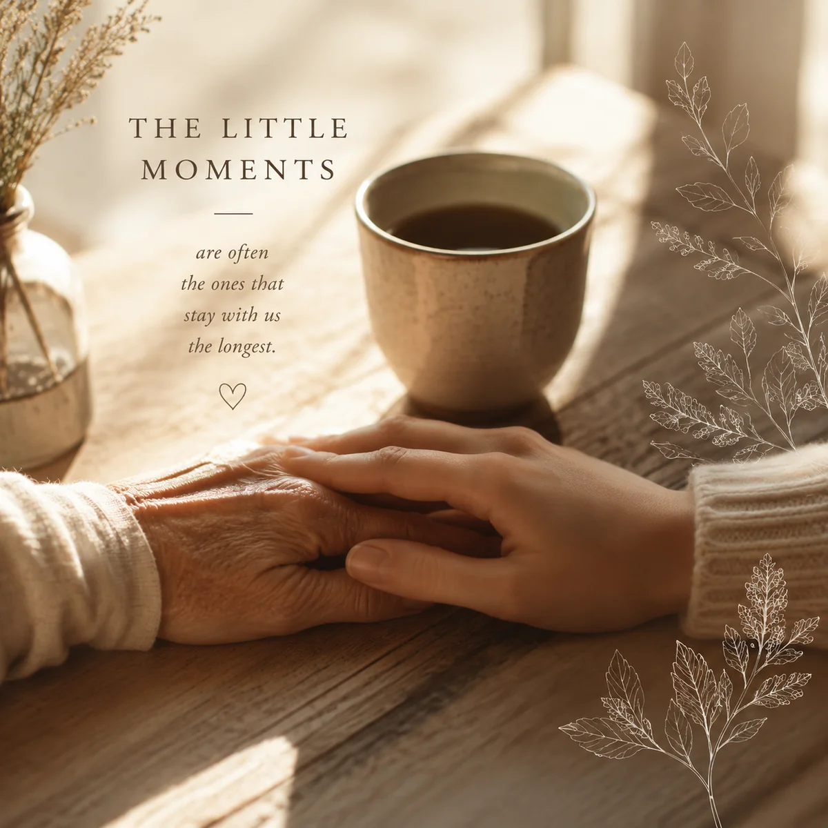 Two hands of different ages resting on a wooden table near a coffee cup in soft morning light