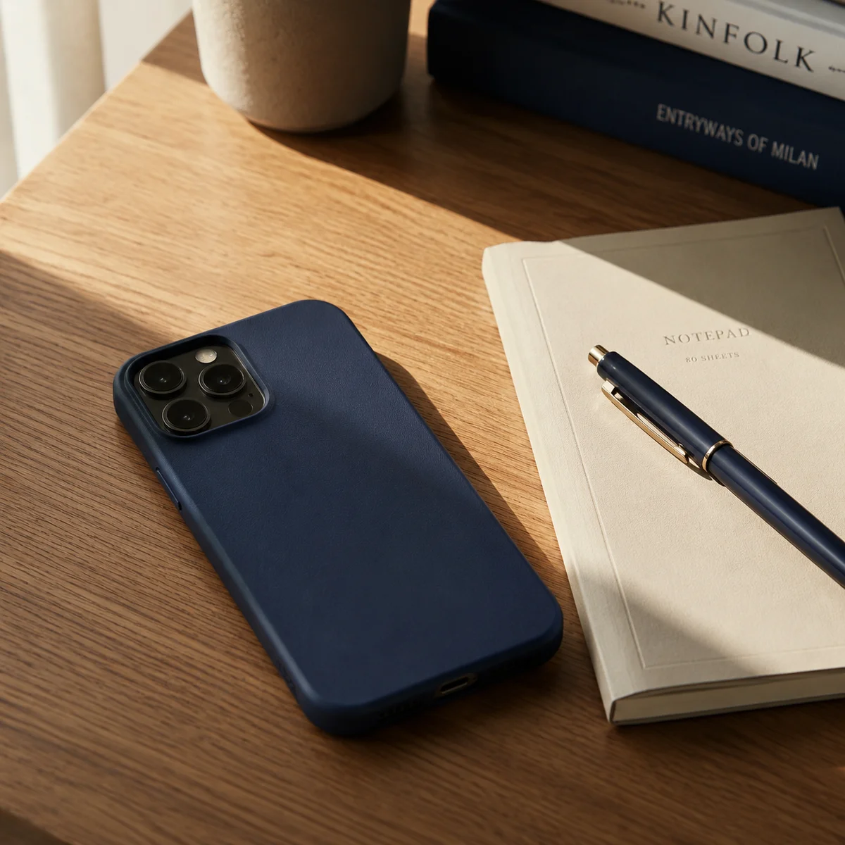 Smartphone face-down on desk representing privacy habits for threesome dating
