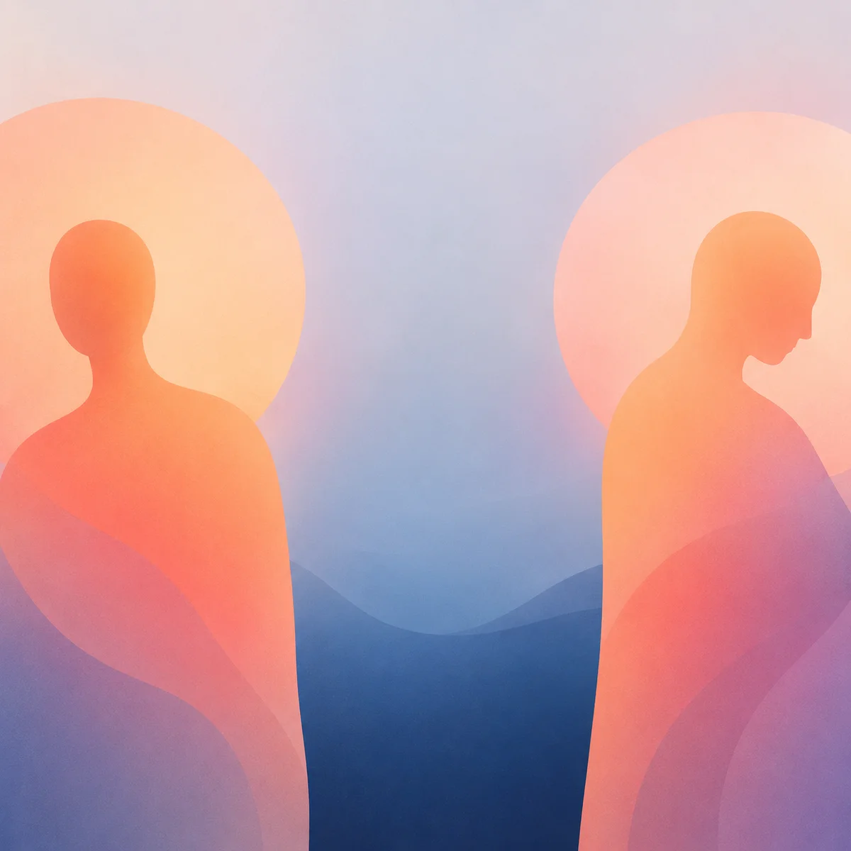Abstract gradient showing emotional distance with warm shapes separated by cool space