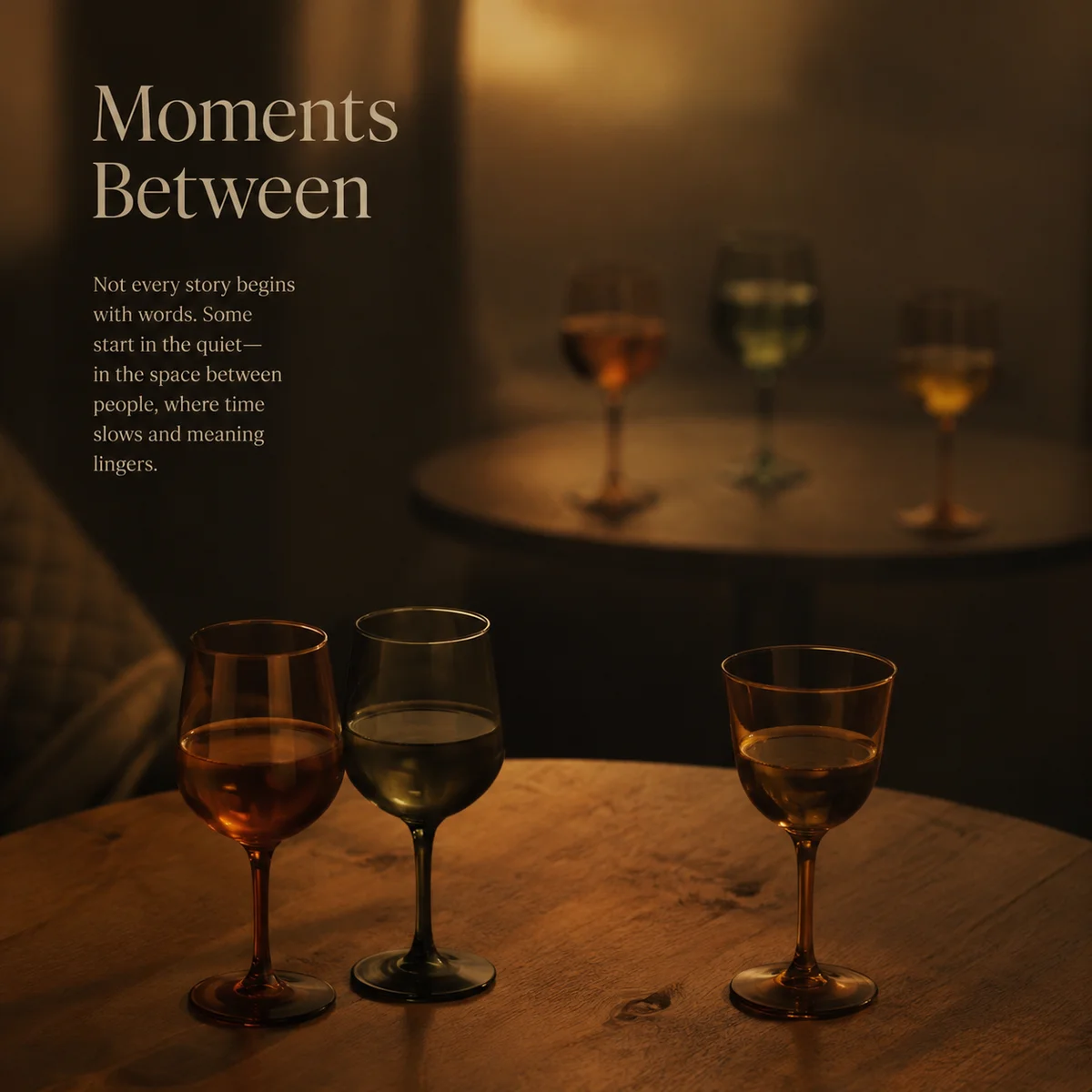 Three glasses transitioning from pair-plus-one to triangle formation on wooden table