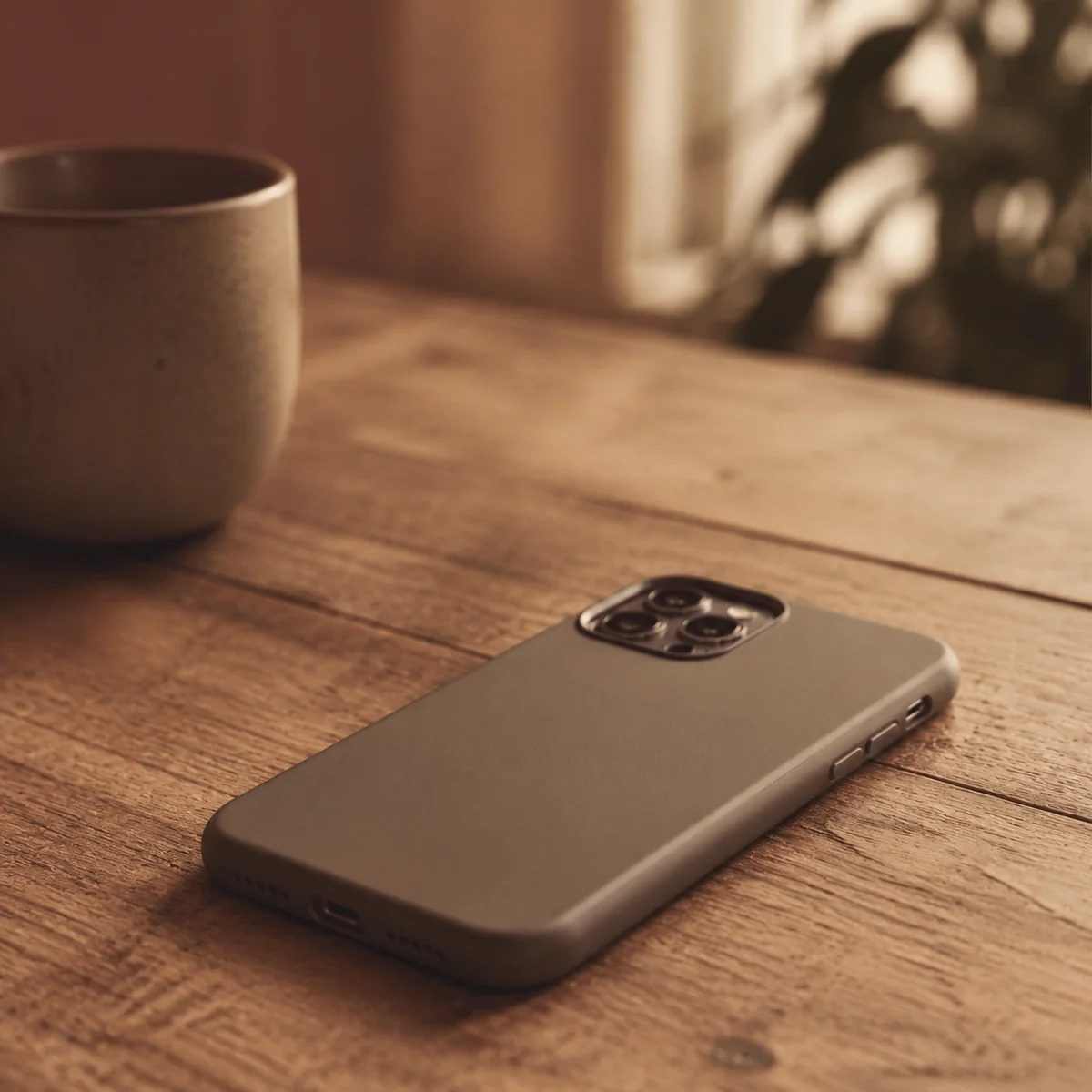 A phone face down on a table symbolizing a digital boundary